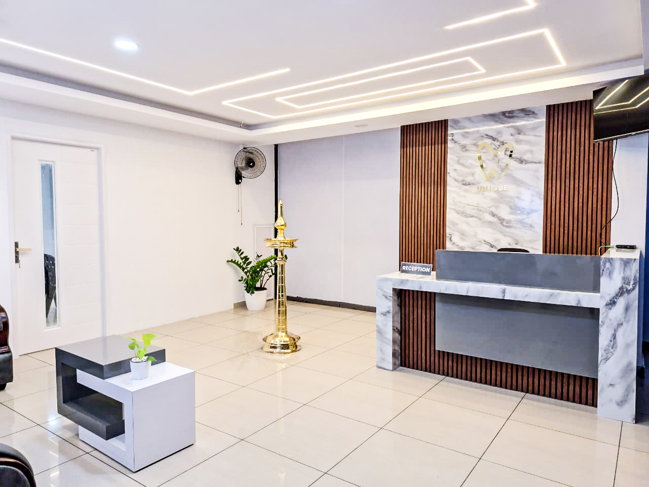 Reception area at Unique Dental Care in Kottarakkara